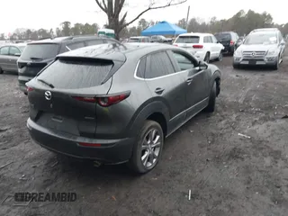 2021 Mazda CX-30 Select with VIN 3MVDMBBL2MM312752, listed as a IAAI auction lot 41933342 with 52,213 mi miles and . Bid and sale history available at DreamBid. Image 4.