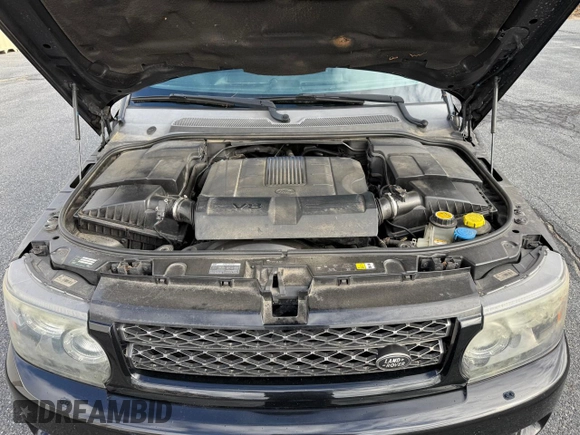 2013 Land Rover Range Rover Sport HSE with VIN SALSF2D45DA770185, listed as a Copart auction lot 54991615 with 104,969 mi miles and Clean Title. Bid and sale history available at carsss.com. Image 7.