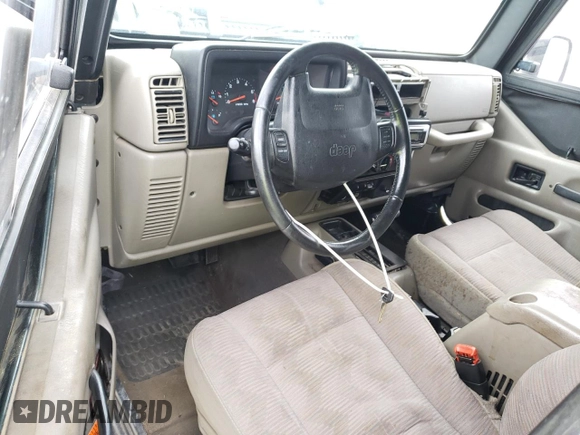 2003 Jeep Wrangler Sport with VIN 1J4FA49S03P330858, listed as a Copart auction lot 59519085 with Not provided miles and Salvage title. Bid and sale history available at DreamBid. Image 8.