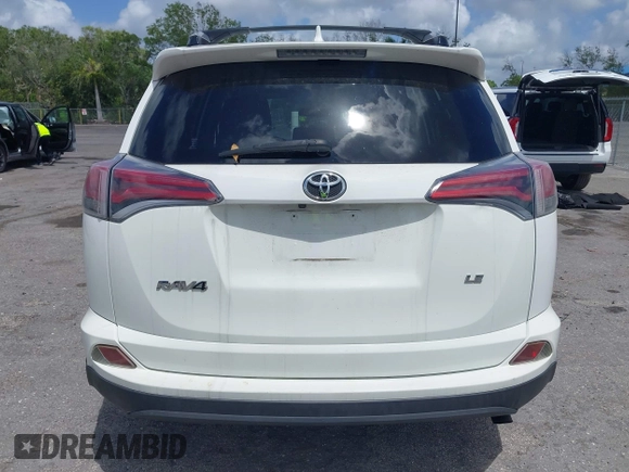 2016 Toyota RAV4 LE with VIN JTMZFREV2GJ096782, listed as a IAAI auction lot 41945319 with 76,866 mi miles. Bid and sale history available at carsss.com. Image 17.