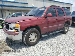 2003 GMC Yukon SLT z VIN 1GKEK13Z03J135059, wystawiony jako Copart lot #58737865 z przebiegiem 239 779 mil mil oraz Szkoda całkowita • Salvage title. Historia ofert i sprzedaży dostępna na DreamBid. Obrazek 1.
