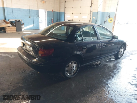 2000 Saturn SL with VIN 1G8ZH5282YZ214070, listed as a IAAI auction lot 41537546 with 94,319 mi miles. Bid and sale history available at carsss.com. Image 4.