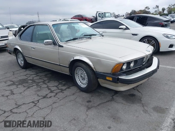 1985 BMW 6 Series 635CSi with VIN WBAEC8400F0610637, listed as a IAAI auction lot 41935412 with 129,943 mi miles. Bid and sale history available at carsss.com. Image 1.