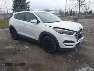 2017 Hyundai Tucson SE with VIN KM8J23A49HU297707, listed as a IAAI auction lot 41257353 with 164,687 mi miles. Bid and sale history available at carsss.com. Image 1.