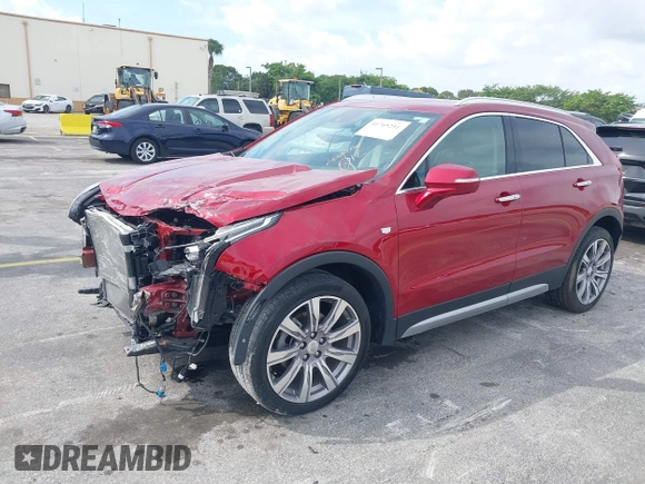 2021 Cadillac XT4 FWD Premium Luxury with VIN 1GYFZCR41MF043072, listed as a IAAI auction lot 41769251 with 31,053 mi miles. Bid and sale history available at carsss.com. Image 2.