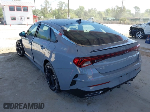 2023 Kia K5 GT-Line z VIN 5XXG64J24PG183772, wystawiony jako IAAI lot #42155447 z przebiegiem 25 313 mil mil oraz . Historia ofert i sprzedaży dostępna na DreamBid. Obrazek 3.