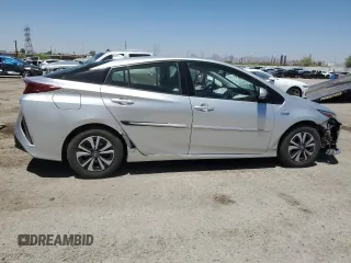 2017 Toyota Prius Plus z VIN JTDKARFP3H3017836, wystawiony jako Copart lot #57613355 z przebiegiem 64 958 mil mil oraz Szkoda całkowita • Salvage title. Historia ofert i sprzedaży dostępna na DreamBid. Obrazek 3.
