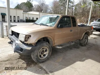 1999 Toyota Tacoma with VIN 4TAWN72NXXZ563507, listed as a Copart auction lot 49888575 with 387,818 mi miles and Salvage title. Bid and sale history available at DreamBid. Image 1.