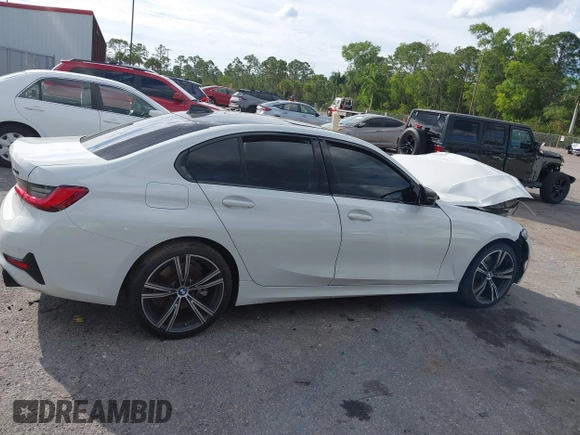 2019 BMW 3 Series 330i z VIN 3MW5R1J57K8A03673, wystawiony jako IAAI lot #41672322 z przebiegiem 72 083 mil mil oraz . Historia ofert i sprzedaży dostępna na DreamBid. Obrazek 13.