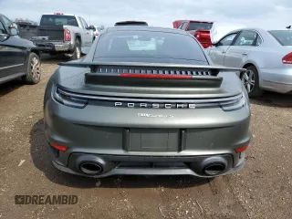 2023 Porsche 911 Turbo z VIN WP0AD2A99PS257416, wystawiony jako Copart lot #54127325 z przebiegiem 7 252 mil mil oraz Szkoda całkowita • Salvage title. Historia ofert i sprzedaży dostępna na DreamBid. Obrazek 6.
