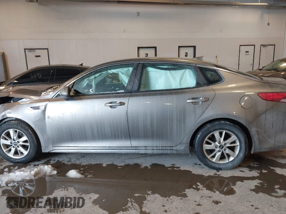 2017 Kia Optima LX with VIN 5XXGT4L33HG148897, listed as a IAAI auction lot 41565592 with 61,471 mi miles and . Bid and sale history available at carsss.com. Image 15.