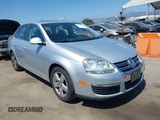 2008 Volkswagen Jetta SE z VIN 3VWRZ71K88M194577, wystawiony jako IAAI lot #42406890 z przebiegiem 114 792 mil mil oraz . Historia ofert i sprzedaży dostępna na DreamBid. Obrazek 1.