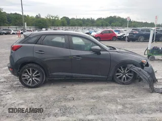 2017 Mazda CX-3 Touring z VIN JM1DKDC7XH0173046, wystawiony jako IAAI lot #42378951 z przebiegiem 223 122 mil mil oraz . Historia ofert i sprzedaży dostępna na DreamBid. Obrazek 12.