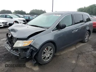 2013 Honda Odyssey EX-L z VIN 5FNRL5H61DB064575, wystawiony jako Copart lot #58962755 z przebiegiem 205 386 mil mil oraz Czysty tytuł • Clean title. Historia ofert i sprzedaży dostępna na DreamBid. Obrazek 1.