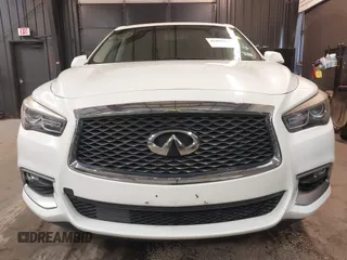 2016 Infiniti QX60 with VIN 5N1AL0MM0GC511950, listed as a IAAI auction lot 41690626 with 102,198 mi miles and . Bid and sale history available at DreamBid. Image 6.