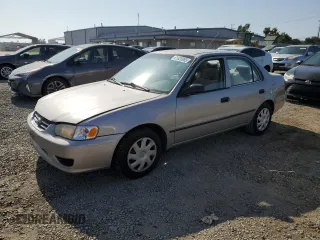 2002 Toyota Corolla CE with VIN 1NXBR12E22Z576273, listed as a Copart auction lot 61820985 with 317,464 mi miles and Salvage title. Bid and sale history available at DreamBid. Image 1.