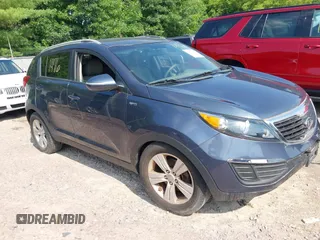 2011 Kia Sportage LX with VIN KNDPBCA27B7084855, listed as a IAAI auction lot 42631476 with 200,219 mi miles and . Bid and sale history available at DreamBid. Image 1.
