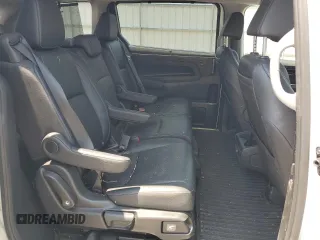 2023 Honda Odyssey Touring with VIN 5FNRL6H84PB016614, listed as a Copart auction lot 59336585 with 36,932 mi miles and Salvage title. Bid and sale history available at DreamBid. Image 11.