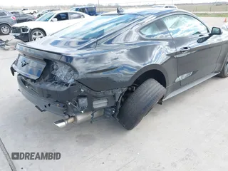 2021 Ford Mustang EcoBoost z VIN 1FA6P8TH2M5140071, wystawiony jako IAAI lot #41775674 z przebiegiem 20 184 mil mil oraz . Historia ofert i sprzedaży dostępna na DreamBid. Obrazek 6.