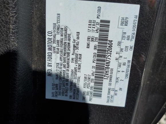 2007 Ford Mustang Deluxe z VIN 1ZVHT84N775320604, wystawiony jako Copart lot #55970295 z przebiegiem 164 642 mil mil oraz Szkoda całkowita • Salvage title. Historia ofert i sprzedaży dostępna na DreamBid. Obrazek 12.