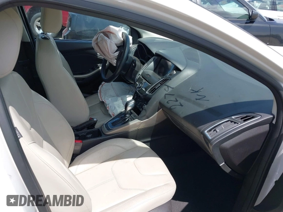 2016 Ford Focus Titanium with VIN 1FADP3N28GL222941, listed as a IAAI auction lot 42050881 with 97,001 mi miles and . Bid and sale history available at DreamBid. Image 5.