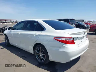 2015 Toyota Camry XLE with VIN 4T1BF1FK4FU477825, listed as a IAAI auction lot 41988429 with 156,886 mi miles and . Bid and sale history available at DreamBid. Image 3.
