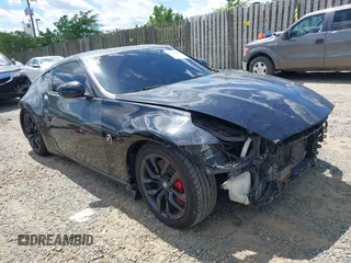 2010 Nissan 370Z Touring z VIN JN1AZ4EH1AM502464, wystawiony jako IAAI lot #42180616 z przebiegiem 145 598 mil mil oraz . Historia ofert i sprzedaży dostępna na DreamBid. Obrazek 1.
