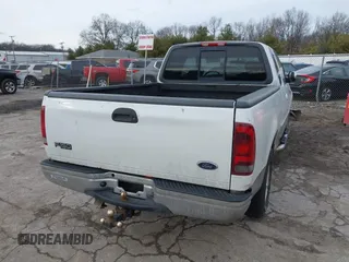 2002 Ford F-150 with VIN 2FTRX17L02CA15425, listed as a IAAI auction lot 41504458 with Not provided miles and . Bid and sale history available at DreamBid. Image 4.