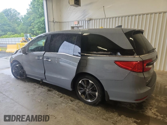 2023 Honda Odyssey Elite with VIN 5FNRL6H90PB071988, listed as a Copart auction lot 58589585 with 12,998 mi miles and Salvage title. Bid and sale history available at DreamBid. Image 2.