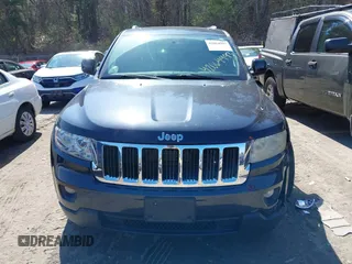2013 Jeep Grand Cherokee Laredo with VIN 1C4RJFAG1DC592371, listed as a IAAI auction lot 42064993 with 136,154 mi miles. Bid and sale history available at carsss.com. Image 12.