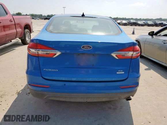 2020 Ford Fusion SE z VIN 3FA6P0HD0LR190390, wystawiony jako Copart lot #57521855 z przebiegiem 125 882 mil mil oraz Czysty tytuł • Clean title. Historia ofert i sprzedaży dostępna na DreamBid. Obrazek 6.