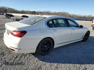 2017 BMW 7 Series 740i with VIN WBA7E2C32HG740649, listed as a Copart auction lot 45593145 with 122,793 mi miles and Salvage Title. Bid and sale history available at carsss.com. Image 3.
