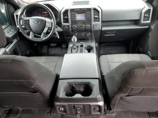 2015 Ford F-150 XLT w/HD Payload Pkg with VIN 1FTFW1EG9FFA35744, listed as a Copart auction lot 51133275 with 128,006 mi miles and Salvage Title. Bid and sale history available at carsss.com. Image 8.