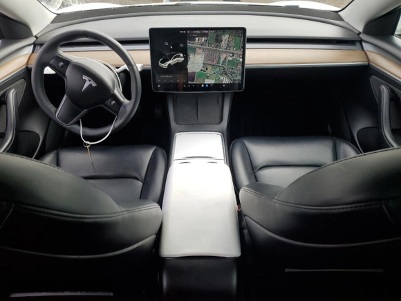 2021 Tesla Model 3 Standard Range Plus with VIN 5YJ3E1EA1MF066389, listed as a Copart auction lot 48053925 with 119,105 mi miles and Salvage Title. Bid and sale history available at carsss.com. Image 8.