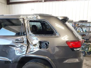 2020 Jeep Grand Cherokee Laredo z VIN 1C4RJFAG9LC325526, wystawiony jako IAAI lot #42609824 z przebiegiem 44 457 mil mil oraz . Historia ofert i sprzedaży dostępna na DreamBid. Obrazek 6.