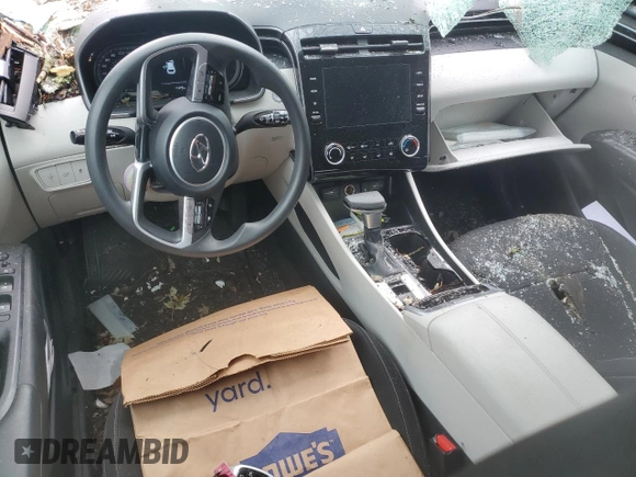 2023 Hyundai Tucson SEL with VIN 5NMJBCAE2PH270674, listed as a Copart auction lot 82879614 with 11,673 mi miles and Salvage Title. Bid and sale history available at DreamBid. Image 8.