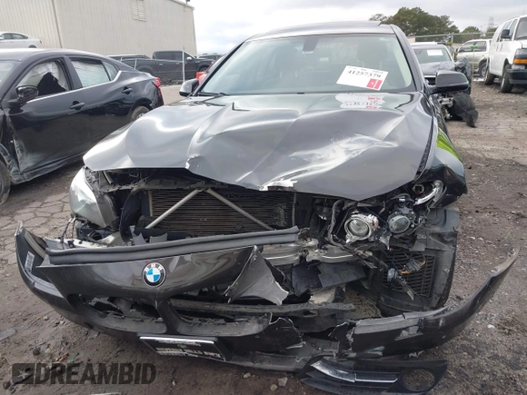 2014 BMW 5 Series 535i with VIN WBA5B1C51ED480639, listed as a IAAI auction lot 41257379 with Not Provided miles. Bid and sale history available at carsss.com. Image 12.