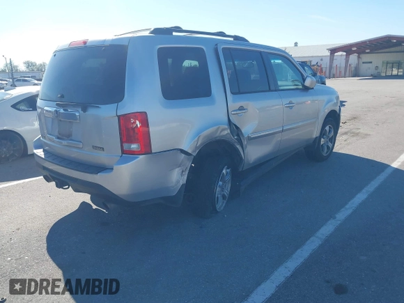 2015 Honda Pilot EX-L with VIN 5FNYF3H69FB001265, listed as a IAAI auction lot 41017830 with 188,572 mi miles and . Bid and sale history available at carsss.com. Image 4.