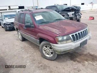 2003 Jeep Grand Cherokee Laredo with VIN 1J4GX48S83C576892, listed as a IAAI auction lot 42082865 with 212,157 mi miles. Bid and sale history available at carsss.com. Image 1.