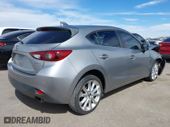 2015 Mazda 3 S Grand Touring with VIN JM1BM1M38F1256560, listed as a IAAI auction lot 41655332 with 121,179 mi miles and . Bid and sale history available at DreamBid. Image 4.