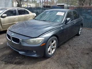 2013 BMW 3 Series 328i with VIN WBA3C1G50DNN93327, listed as a IAAI auction lot 41865009 with 175,371 mi miles and . Bid and sale history available at carsss.com. Image 2.