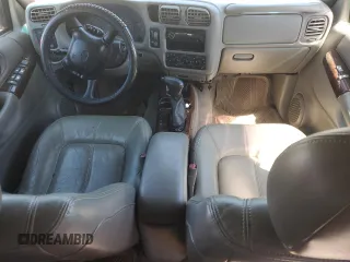2001 Oldsmobile Bravada z VIN 1GHDT13W012174620, wystawiony jako Copart lot #50523084 z przebiegiem Nie podano mil oraz Szkody całkowita. Historia ofert i sprzedaży dostępna na DreamBid. Obrazek 8.