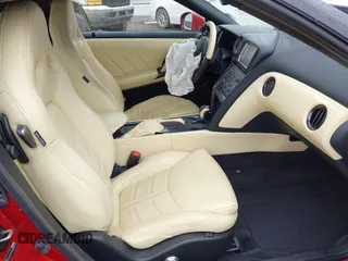 2015 Nissan GT-R Premium z VIN JN1AR5EFXFM280227, wystawiony jako IAAI lot #41920650 z przebiegiem 79 140 mil mil oraz . Historia ofert i sprzedaży dostępna na DreamBid. Obrazek 5.