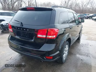 2019 Dodge Journey SE with VIN 3C4PDCBB8KT844800, listed as a IAAI auction lot 41721062 with 148,390 mi miles and . Bid and sale history available at DreamBid. Image 4.