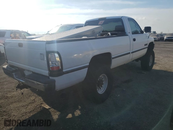 1995 Dodge 2500 with VIN 1B7KF26C9SS304696, listed as a Copart auction lot 76398944 with 217,725 mi miles and Salvage Title. Bid and sale history available at carsss.com. Image 3.