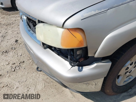2004 Chevrolet Tahoe LT with VIN 1GNEK13Z64J292910, listed as a IAAI auction lot 42570170 with 309,679 mi miles and . Bid and sale history available at DreamBid. Image 12.