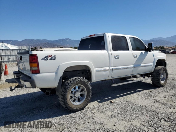 2002 GMC Sierra 1500HD SLE z VIN 1GTGK13U22F213058, wystawiony jako Copart lot #67418174 z przebiegiem 178 940 mil mil oraz Szkody całkowita. Historia ofert i sprzedaży dostępna na DreamBid. Obrazek 3.