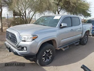 2020 Toyota Tacoma SR5 with VIN 3TMCZ5AN1LM324828, listed as a IAAI auction lot 40977362 with 33,906 mi miles and . Bid and sale history available at DreamBid. Image 6.