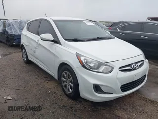 2014 Hyundai Accent GS z VIN KMHCT5AE2EU192769, wystawiony jako IAAI lot #42189835 z przebiegiem 135 623 mil mil oraz . Historia ofert i sprzedaży dostępna na DreamBid. Obrazek 1.