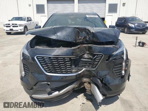 2021 Cadillac XT4 FWD Premium Luxury z VIN 1GYFZCR48MF002468, wystawiony jako Copart lot #50878955 z przebiegiem 76 034 mil mil oraz Szkoda całkowita • Salvage title. Historia ofert i sprzedaży dostępna na DreamBid. Obrazek 5.